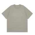 Fear of God Essentials middle logo ash